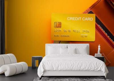 Credit card on wellet and 100 dollars with orange paper background. for travel summer in holidays. planing earn money investment and saving money future for 2022 new year. finance and business concept Wall mural