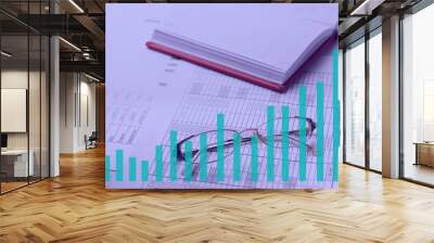 Accountant work table with calculator, charts and pen. Wall mural