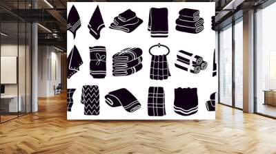 Household towel silhouettes. Black textile rolled and hanging towels. Fabric bathroom, kitchen towels vector illustration symbols set. Silhouette black bathroom towel, beach or kitchen Wall mural