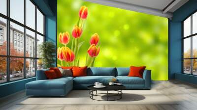 bunch of bright colorful tulips isolated on abstract green spring background with sunlight , happy easter greeting card concept with copy space Wall mural