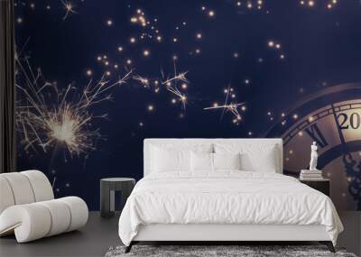 countdown clock 2025 with two burning sparklers and stars isolated on dark blue night sky background, happy new year greeting card banner Wall mural