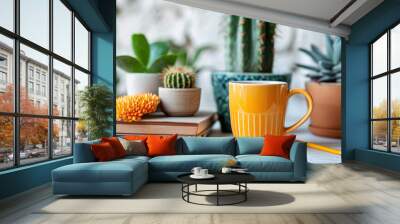 mugs mockup with notepad, accessories on white table and green plant in pot. Front view Wall mural