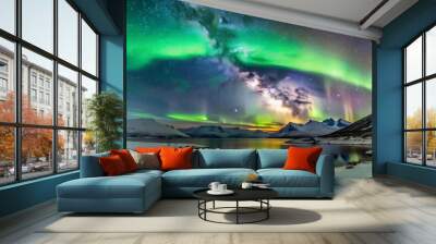 Aurora under the scenery of milky way. Aurora borealis on Iceland with lake reflection Wall mural