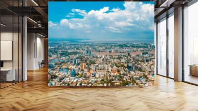 Aerial view of Lagos cityscape before the sea on a sunny day Wall mural