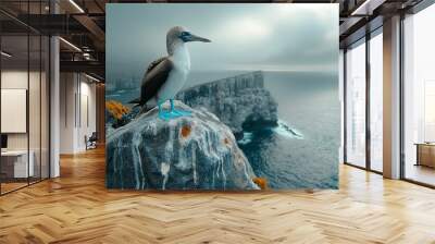 AI generated illustration of a blue-footed booby perched on a cliff with a scenic view of the ocean Wall mural