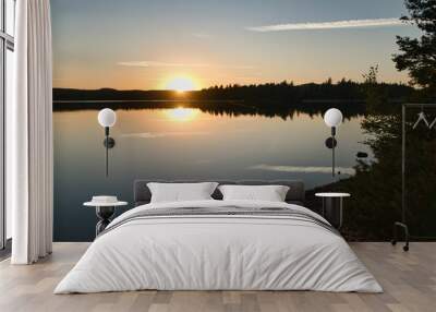 Beautiful bright sunrise over the lake shore Wall mural