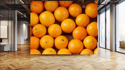 Beautiful view of oranges in the basket for sale Wall mural