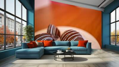 Chocolate-covered pastries with white icing Wall mural