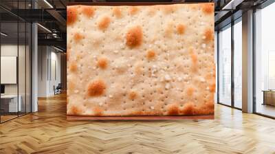 Closeup shot of a homemade seasoned cracker on an isolated background Wall mural