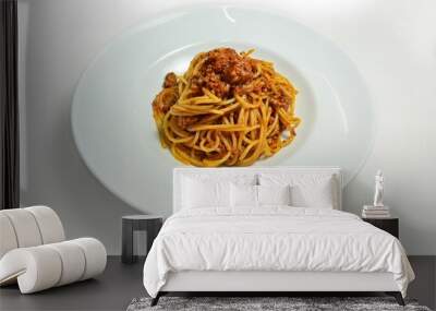 Gourmet plate of bolognese spaghetti isolated on a white background Wall mural