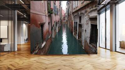 Picturesque canal between historical buildings in Venice Wall mural