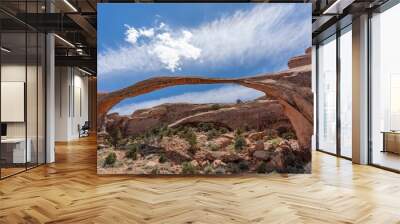 Sandstone Arch at Arches national park with blue cloudy sky in Utah - USA Wall mural