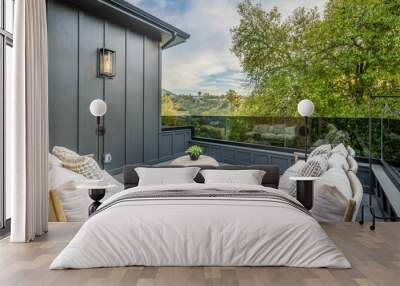 two white couches sitting on top of a tiled patio Wall mural