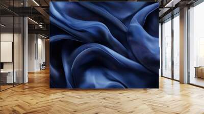 Elegant close-up of swirling dark fabric, showcasing smooth textures and rich colors, perfect for fashion or design projects. Wall mural