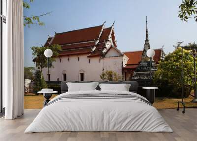 Old Thai buddhist tample with clear blue sky Wall mural