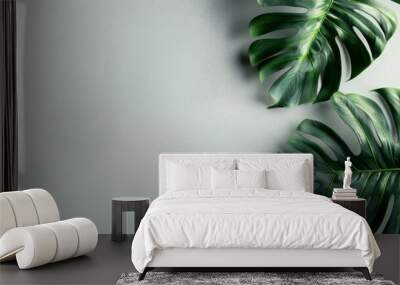 Tropical Monstera Leaves on Minimal Gray Background. Green, Natural, and Lush for Design Elements, Nature Backdrop, and Eco-Friendly Themes Wall mural