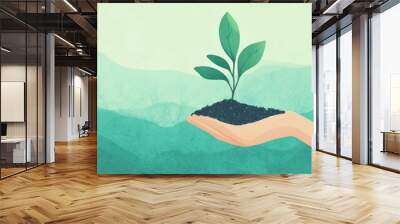 A hand holding a plant in a pot Wall mural