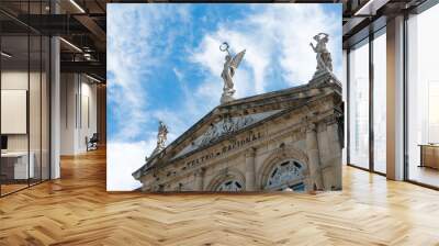 View of the gable roof of National Theater in Costa Rica downtown square with angle, beautiful blue sky and copy space for text. Wall mural