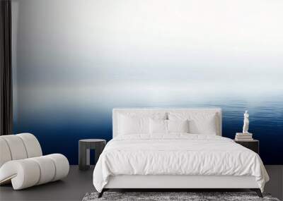 Calm and tranquil blue water with fog in the distance. Wall mural