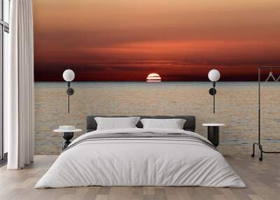 Sunrise over the Mediterranean Sea seen from the beach in Torremolinos. Costa del Sol, Spain Wall mural