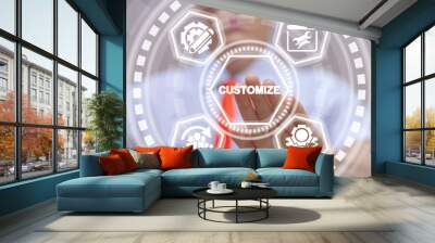 Businessman uses virtual touchscreen and touches word: customize. Customization product business concept. Wall mural