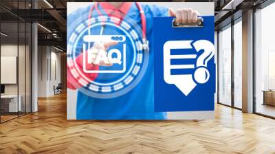 Doctor holds a blue clipboard with question talk balloon and pushing website faq button. FAQ, web guide, web frequently answer question medicine concept. Wall mural