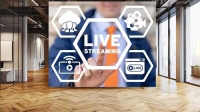 Live streaming social media web network concept. Man using virtual touchscreen presses live streaming inscription. Broadcast online technology stream video and music. Internet marketing. Wall mural