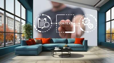 Man using virtual touch screen presses word: CONTEXT. Context business education concept. Context analytic and learning. Wall mural