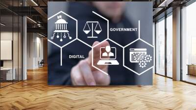 man using virtual touch screen sees text: digital government. electronic government concept. modern  Wall mural