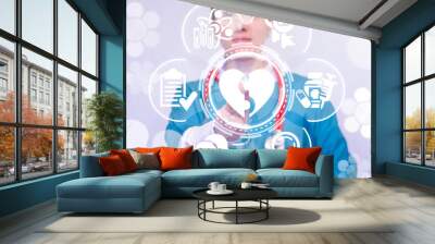 Young female doctor working on a virtual screen of the future and touching the icon: puzzle piece heart. Medicine and pharmacy matching concept. Wall mural