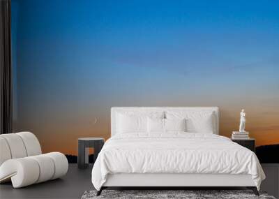 Colorful clear sky with no clouds at dusk after sunset. Wall mural