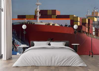 MARITIME TRANSPORT - A container ship sails with cargo to the sea port Wall mural