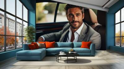 Attractive elegant happy man in good car. Wall mural