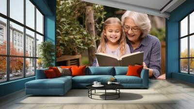 Cheerful grandmother and granddaughter are reading a book together. Generative AI Wall mural