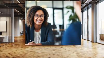 Female hiring manager interviewing a job candidate in her office Wall mural