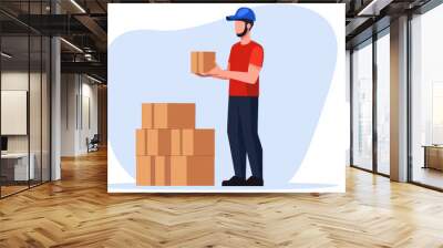 A delivery worker in a red shirt and blue cap holds a box near stacked cartons, set against a light background. Wall mural