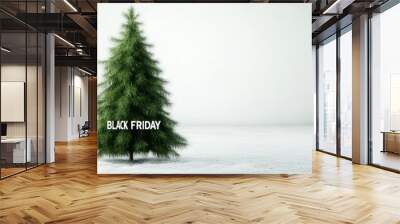 Green Christmas tree in snowy landscape with Black Friday text, promoting holiday sales and seasonal discounts. Wall mural