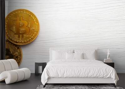 Two golden coins with the letter B on them sit on a white background Wall mural