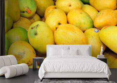 yellow mangoes in the market Wall mural