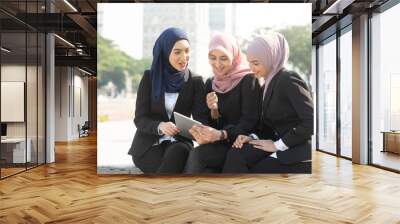 Muslim business women discussing Wall mural