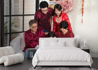 asian family celebrating chinese new year Wall mural