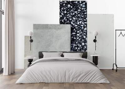 top view of interior material samples contains gloss and matt grey tiles, black and white terrazzo artificial stone, white marble quartz isolated on background with clipping path. Wall mural