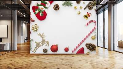 christmas frame. Red, gold and green christmas decoration on white background top view flat lay mockup. Xmas 2019 Wall mural