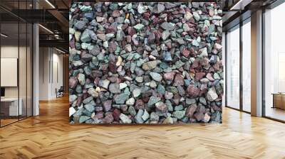 Many medium-sized stones that are used to lay the train tracks Wall mural