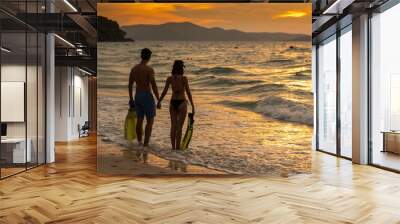 Couple in love having romantic tender moments at sunset Wall mural