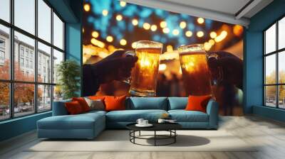 Cheers to friendship and celebration as two hands raise frosty mugs of beer under canopy of warm festival lights, creating joyful atmosphere Wall mural