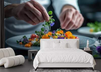 A chef carefully garnishing a dish with microgreens and edible flowers, showcasing the visual appeal in fine dining presentation Wall mural