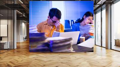 Both male and female employees are required to work overtime to meet deadlines. Employee commitment keeps operations running smoothly and supports organizational goals during times of high demand. Wall mural