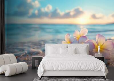 Beautiful frangipani flowers on the beach with blue sky and sea background banner, copy space for text Summer vacation concept Wall mural