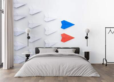 Blue and red paper plane leading among white. leaders of two business teams or competition of two leaders concept. Wall mural